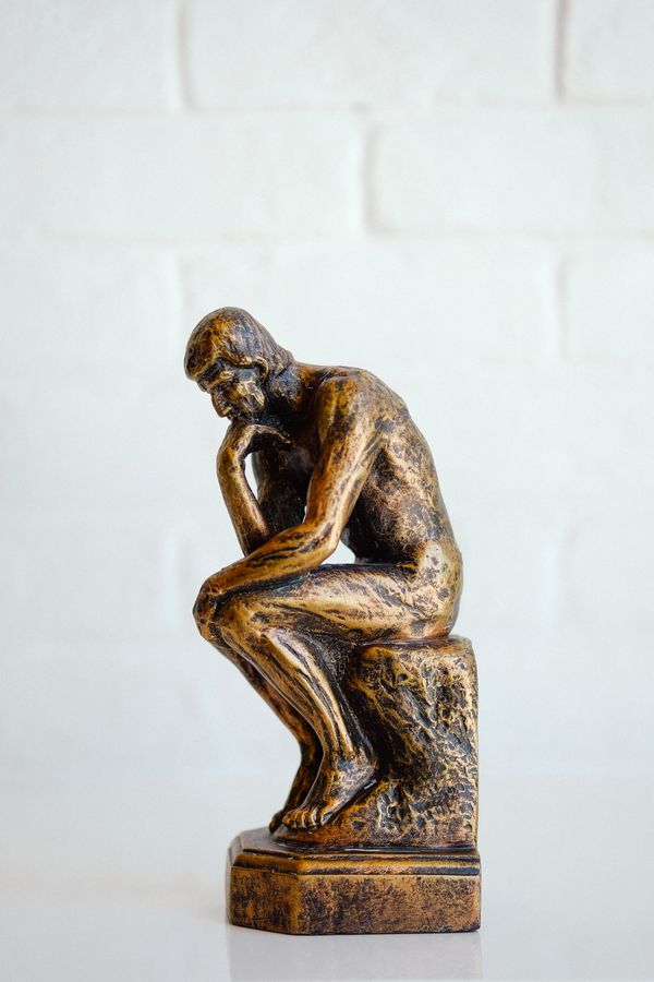 Statue of a man thinking